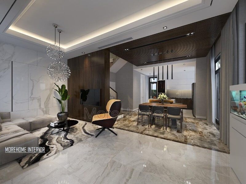 Điểm nhấn ấn tượng giữa gỗ ốp tường cùng đá lát sàn cao cấp tạo nên ánh nhìn hiện đại, sang trọng cho phòng khách liền bếp ăn.